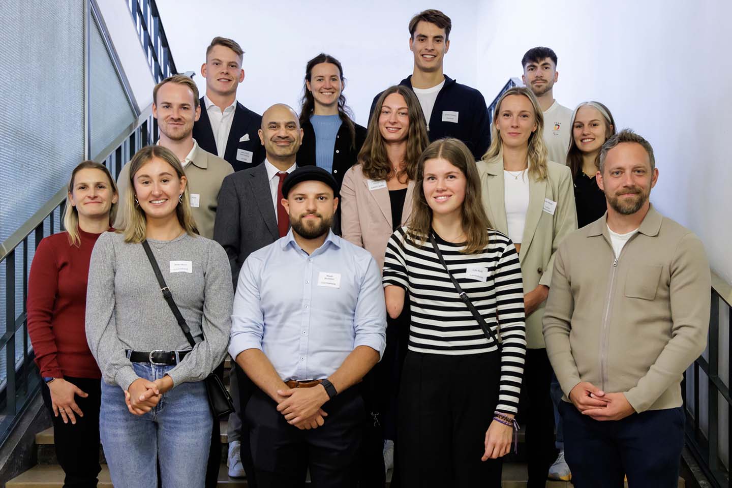 Gruppenbild der Olympioniken mit dem Rektor